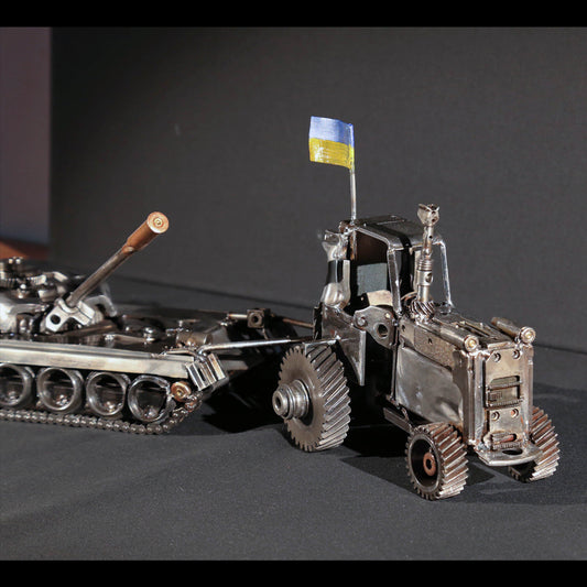 Ukrajinský traktor táhne ruský tank