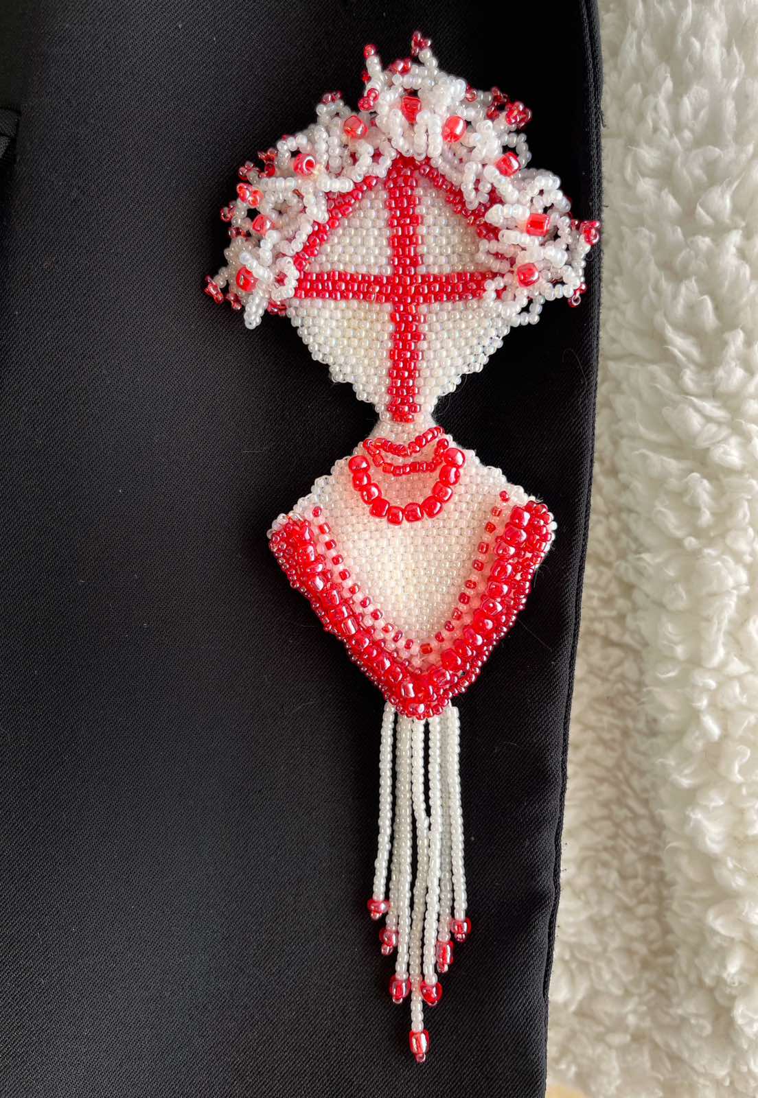 Brooch with flechette designed by Ukrainian artist Anna Huliaieva, recovered in Kyiv Oblast 2022