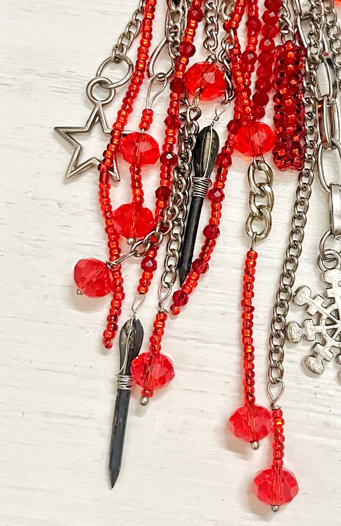 Brooch with flechette designed by Ukrainian artist Anna Huliaieva, 11-12cm long, recovered in Kyiv Oblast 2022