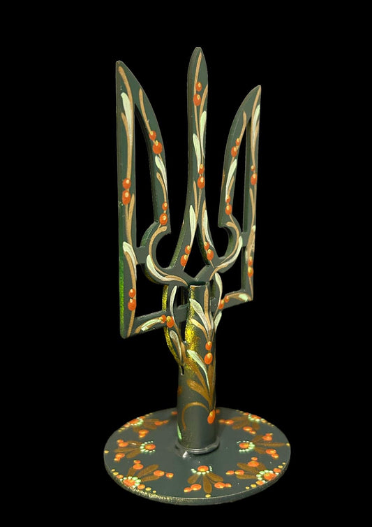 Small tryzub with bullet cartridge. (284)