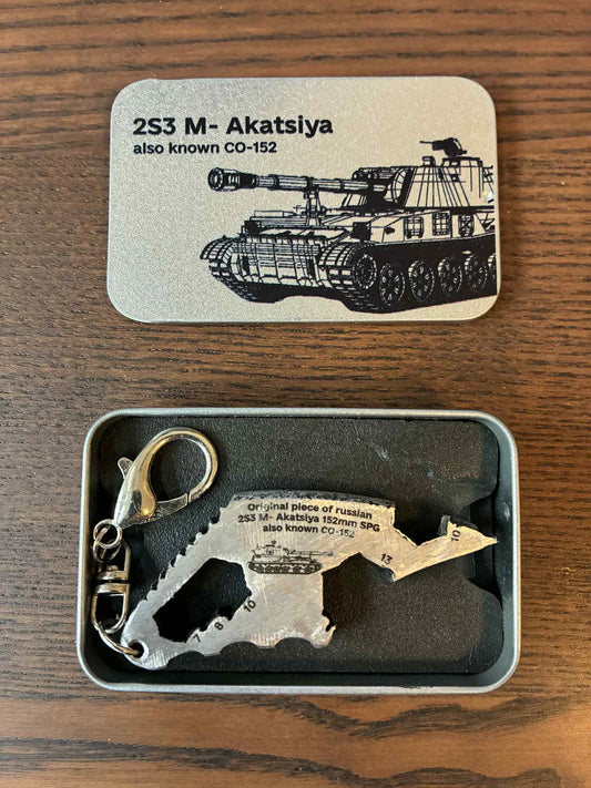 Engraved keychain (multi-tool device & bottle-opener) made from the barrel of a destroyed Russian 2S3 Akatsiya Self Propelled Howitzer