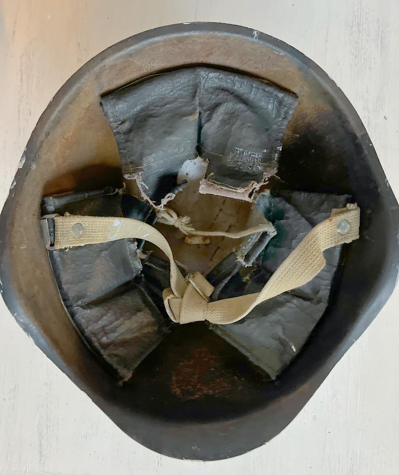 Close-up of 30mm helmet shell with detailed "window view" artwork by Anna Huliaieva