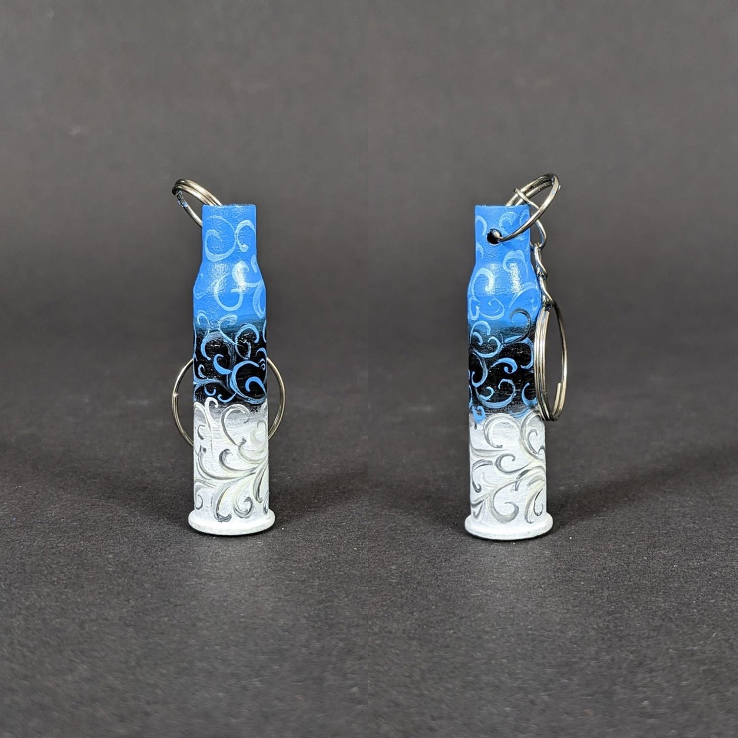 Estonia small caliber keychain painted in Estonian flag colors