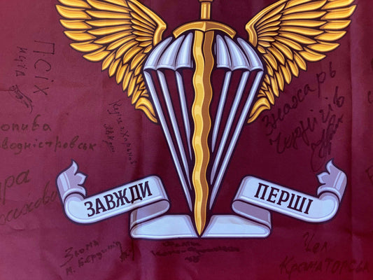 Flag 82nd Air Assault Brigade with signatures of Ukrainian warriors for donation fundraising