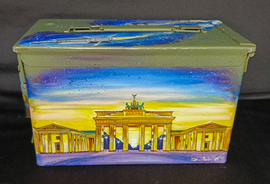 Painted .50 caliber ammo box artwork by Tanya Shacun with dimensions 30x15x19 cm