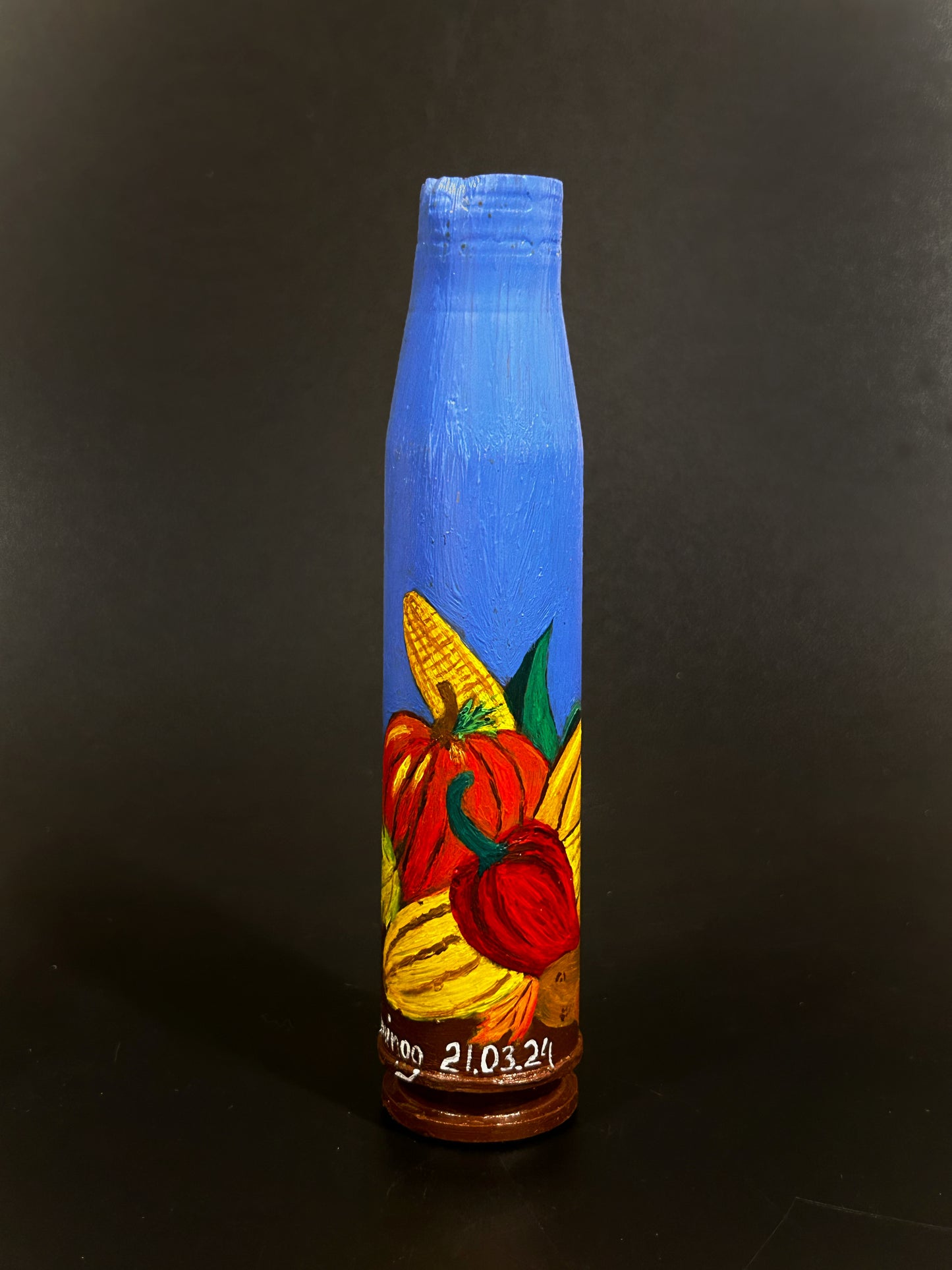 30mm shell with drawing of Seminog's garden vegetables.