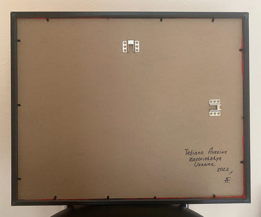 "Air raid siren on". Wool map of Ukraine made from fletchettes (1063)