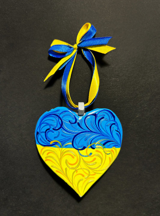 Iron Heart ornament painted with Danish and Ukrainian flags made from 122mm grad rocket