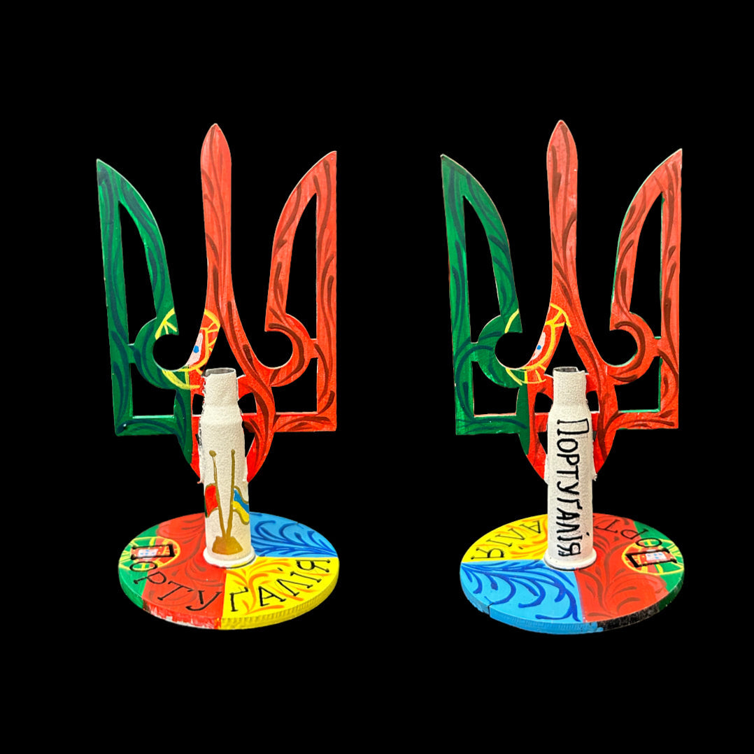 Tryzub emblem painted with Portuguese flag colors and bullet cartridge, artwork by Anastasia Leonova