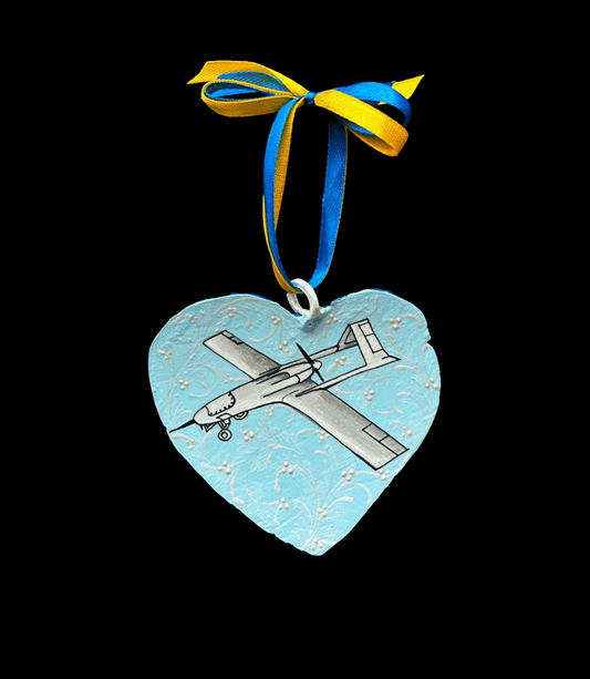 Ukrainian Liutyi drone ornament crafted from 122mm grad rocket by Victory Gallery artist Anastasia Leonova and Hisoshi Art Studio