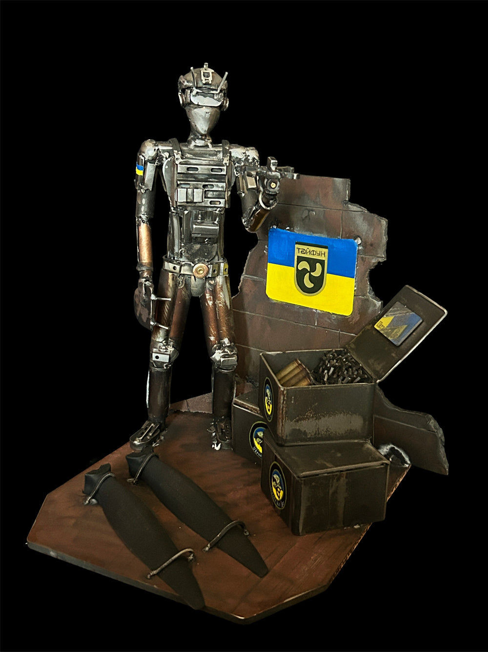 Soldier from Special Forces Typhoon receiving drones supplied by Ukraine Aid Ops with drone propeller engraved by Eugene Sopko