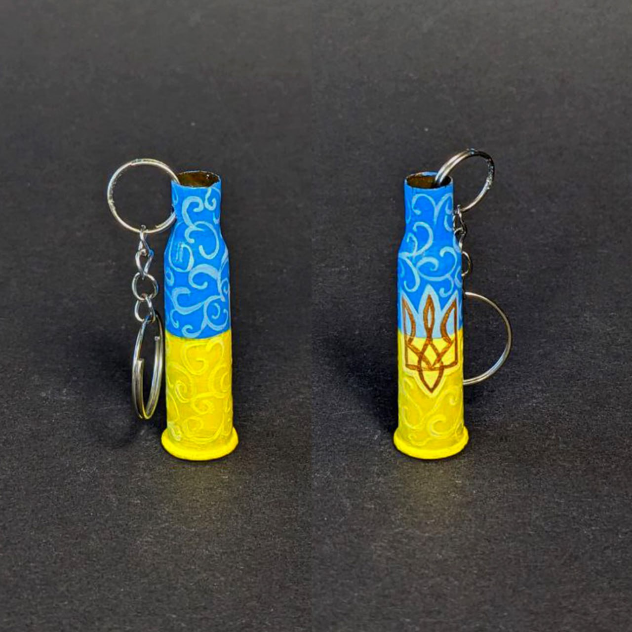 Small caliber keychain painted with Ukrainian flag colors