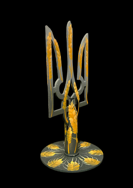 Small tryzub with bullet cartridge. (288)