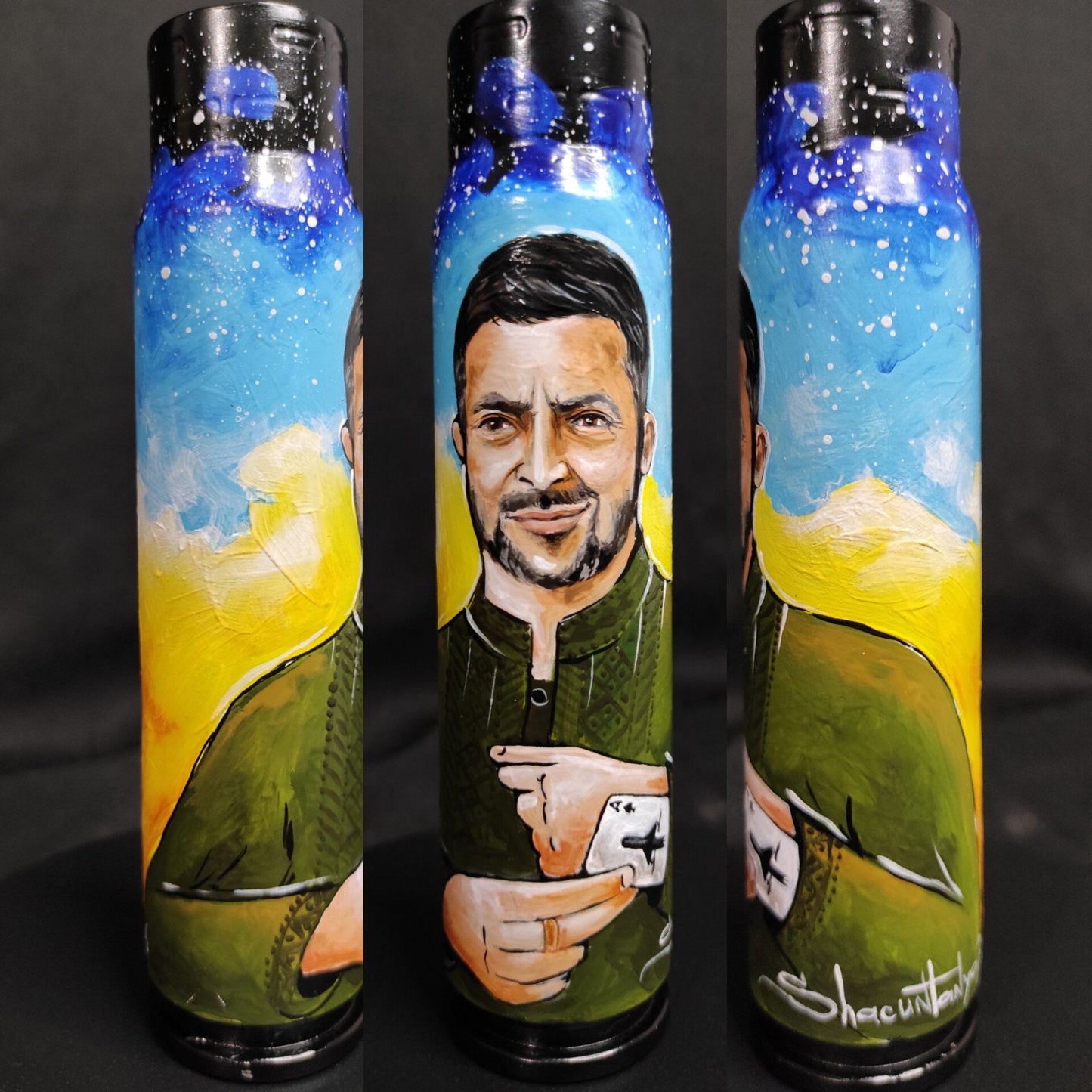 Zelensky pulling an ace of cards painted on a 30mm shell