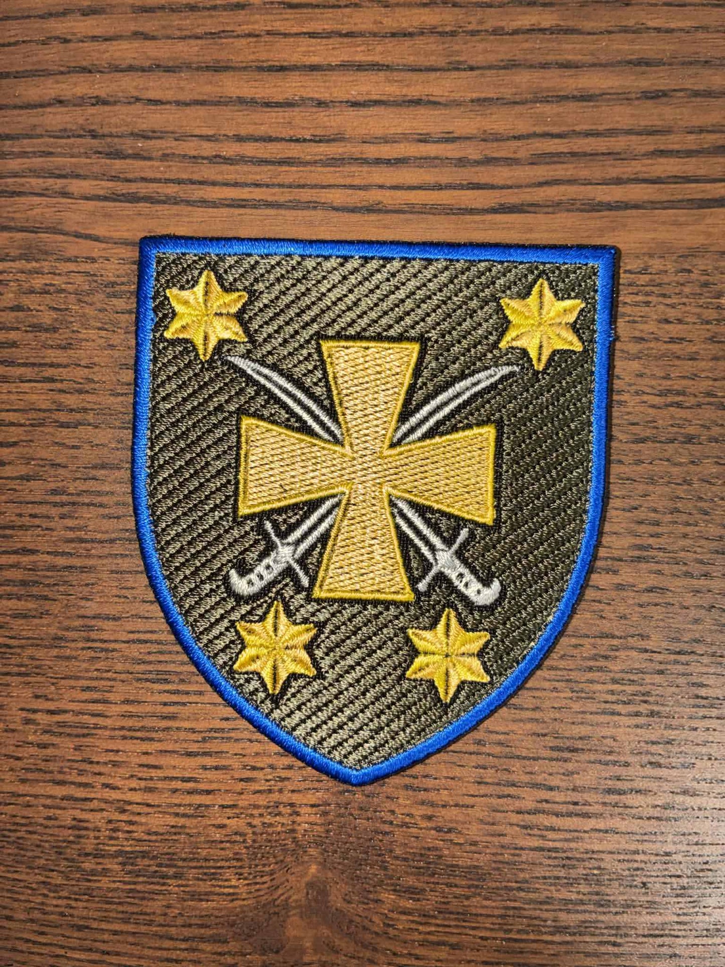 Patch of the 116th Mechanized Brigade supporting Ukrainian defenders fundraiser