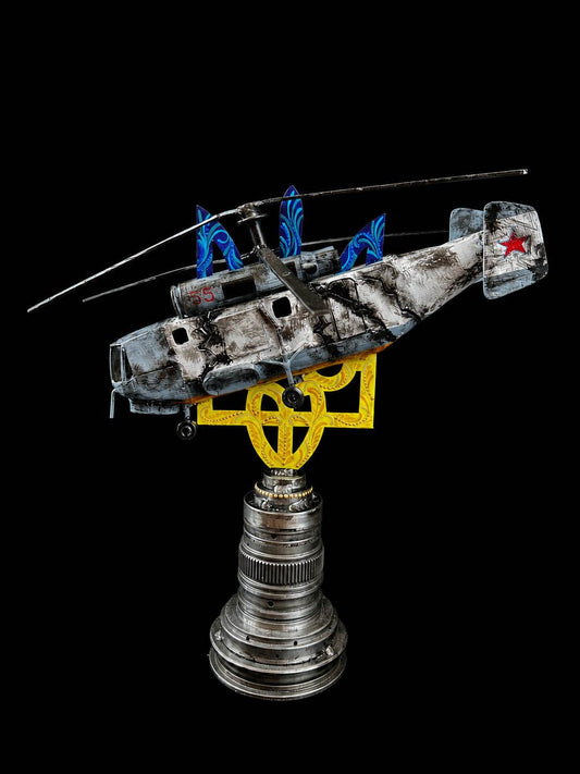 Destroyed KA-27 helicopter impaled on Tryzub sculpture by Hisoshi Art Studio and painted by Anastasia Leonova