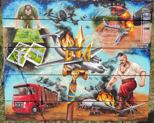 Operation Spiderweb painted ammunition box by Tanya Shacun with cat nearby