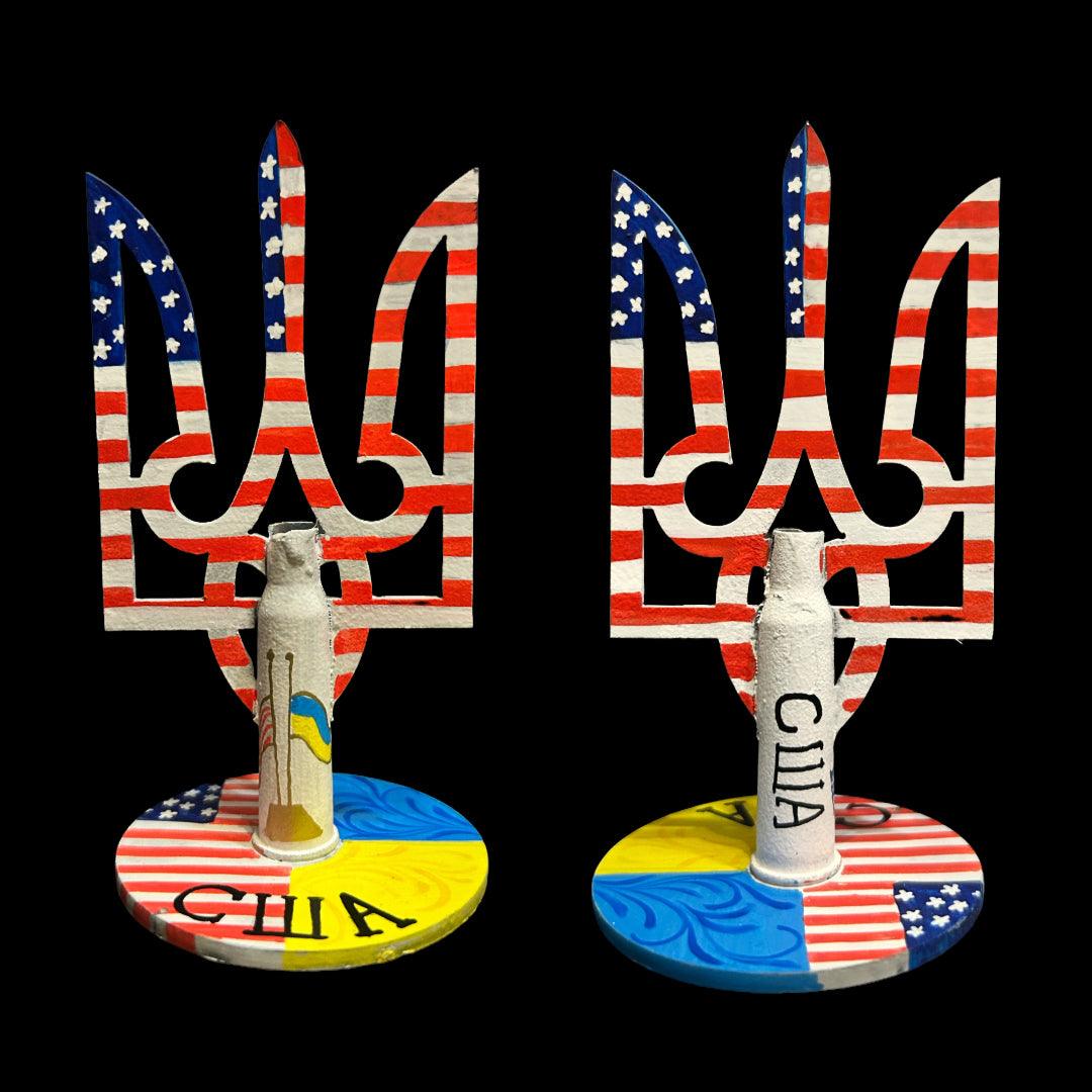 United States flag painted on Tryzub symbol with bullet cartridge artwork by Anastasia Leonova