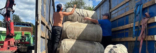 UAO volunteers unloading anti-drone camouflage nets for Total Defense against Drones campaign