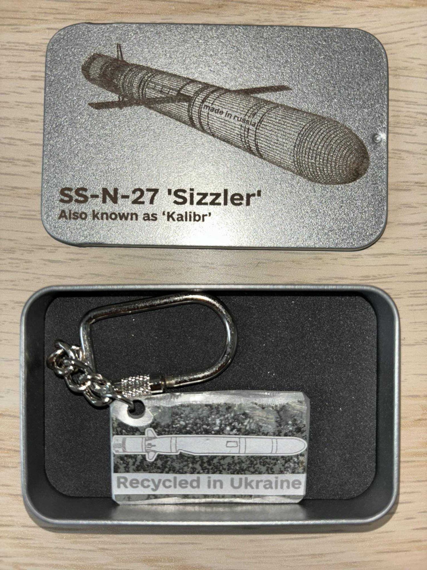 Unique keychains and ornaments made from destroyed Russian equipment, cut and engraved in Ukraine