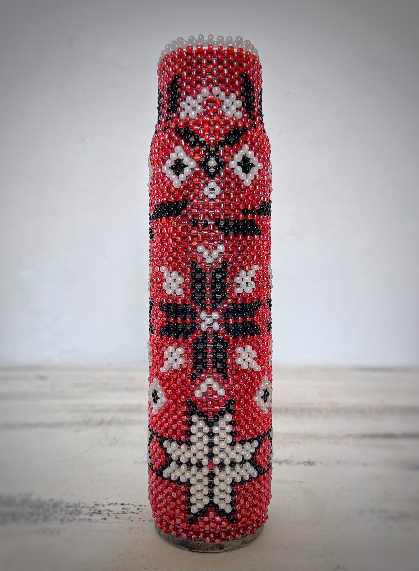 30mm shell made with cross stitching beads. (1118 AH)