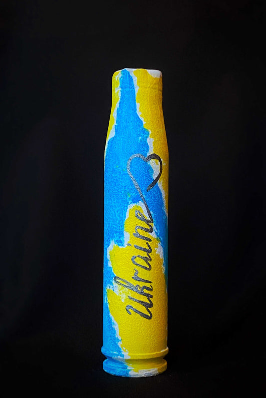 23mm shell painted with Ukrainian flag colors by Anna Huliaieva