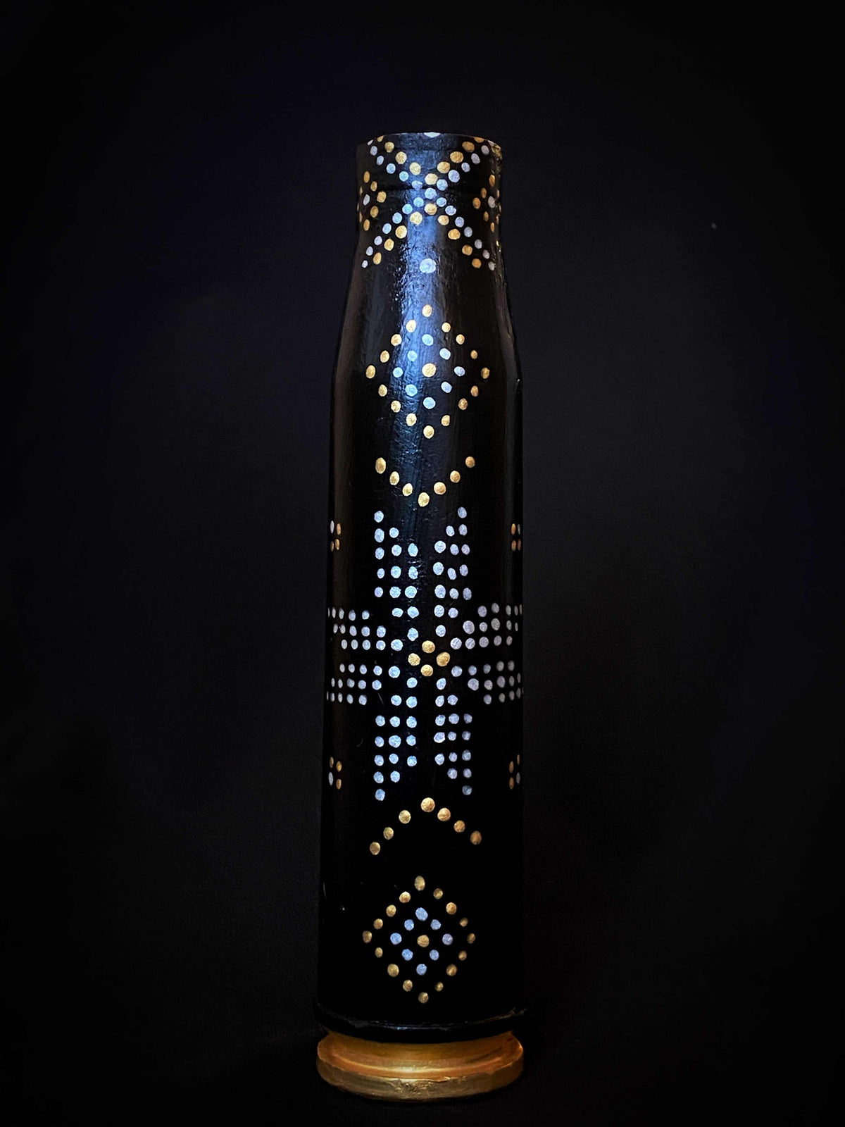 23mm shell with intricate patterns designed by Anna Huliaieva, 15cm tall artwork