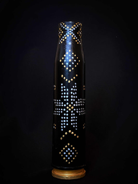 23mm shell with intricate patterns designed by Anna Huliaieva, 15cm tall artwork