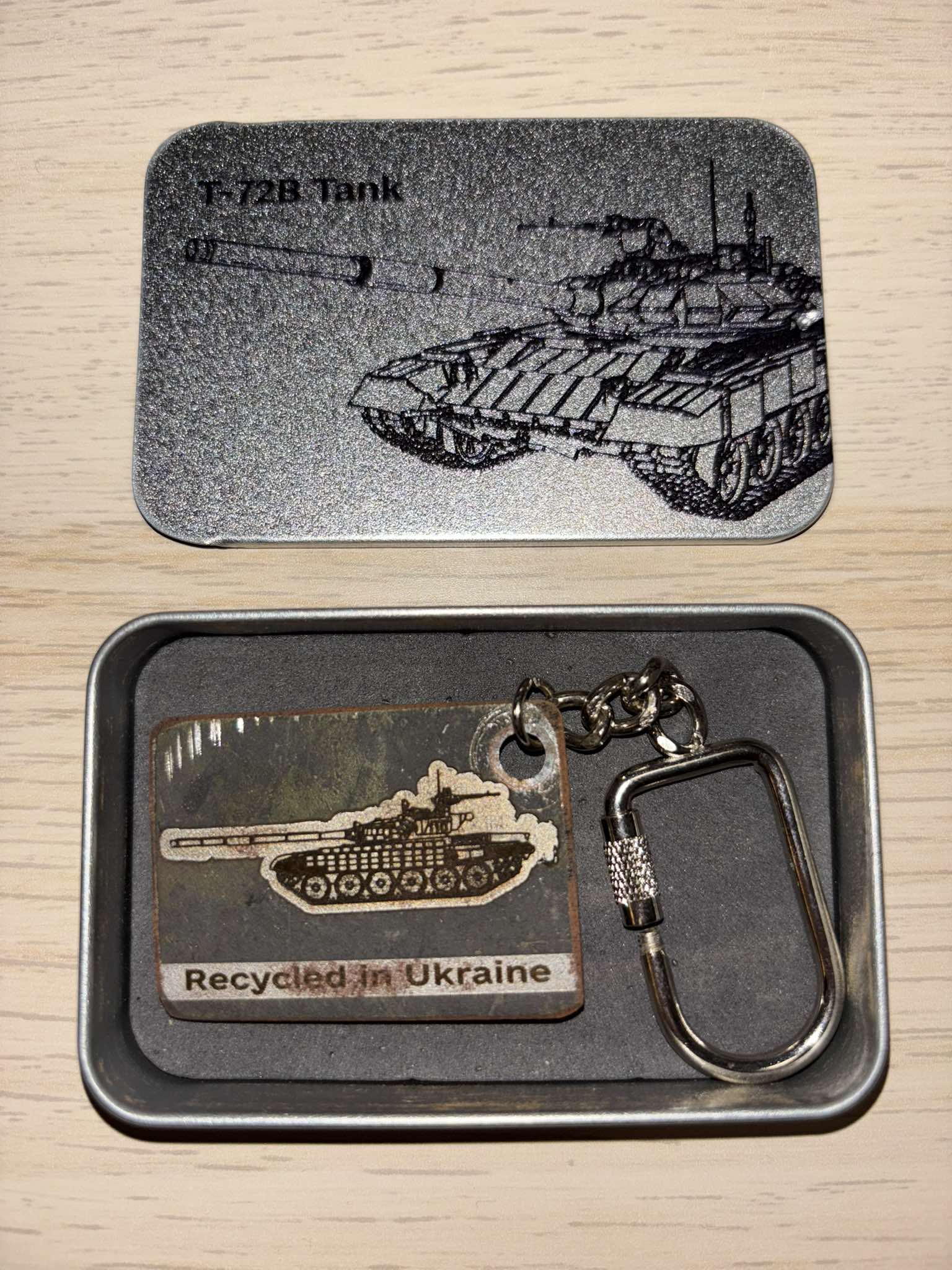 Engraved keychain made from a destroyed Russian T72B tank