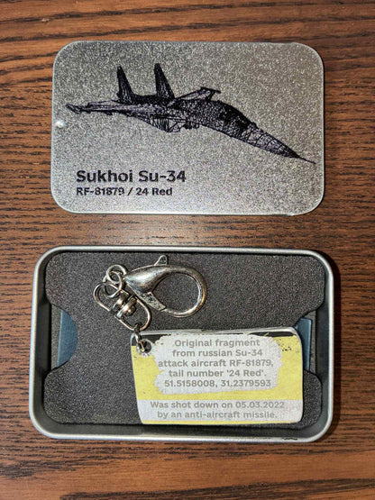 Engraved keychain made from a shot down SU-34 plane (RF-81879 - 24 Red, shot down near Kyiv in 2022)