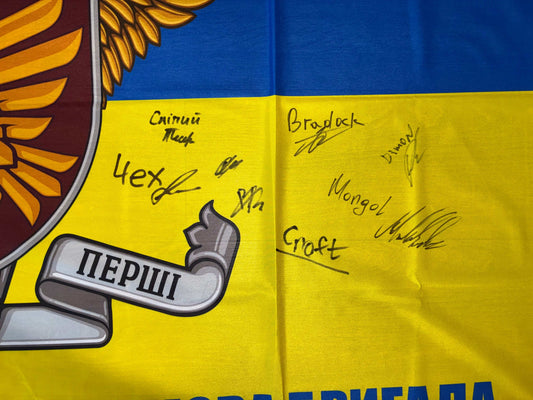 Flag of the 95th Air Assault Brigade with signatures supporting Ukrainian defenders