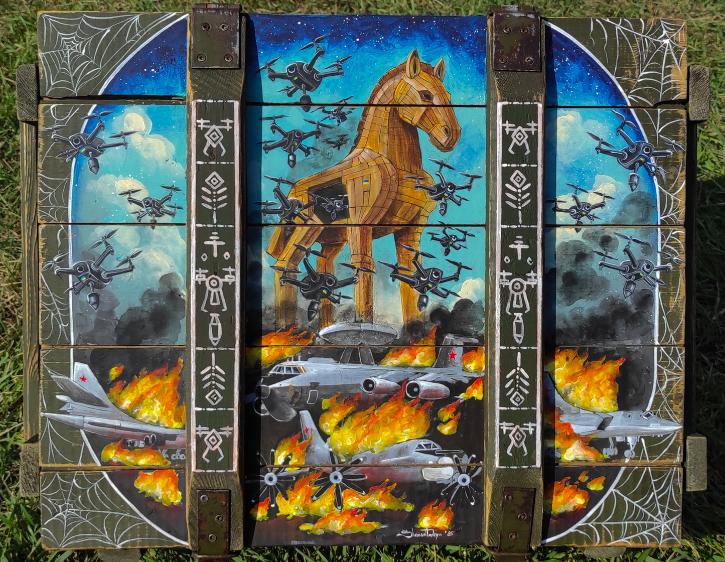 "Operation Spiderweb." painted ammunition box.