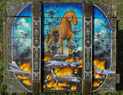 "Operation Spiderweb." painted ammunition box.