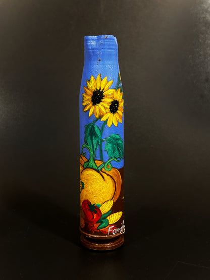 30mm shell with drawing of Seminog's garden vegetables.