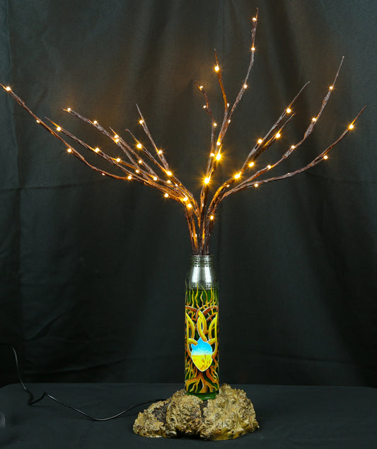 Tree of light growing from shell.