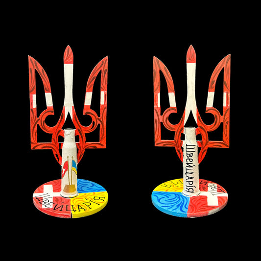 "Дякую, Швейцаріє." Швейцарський прапор намальований на Tryzub (13.5x6.5 см).