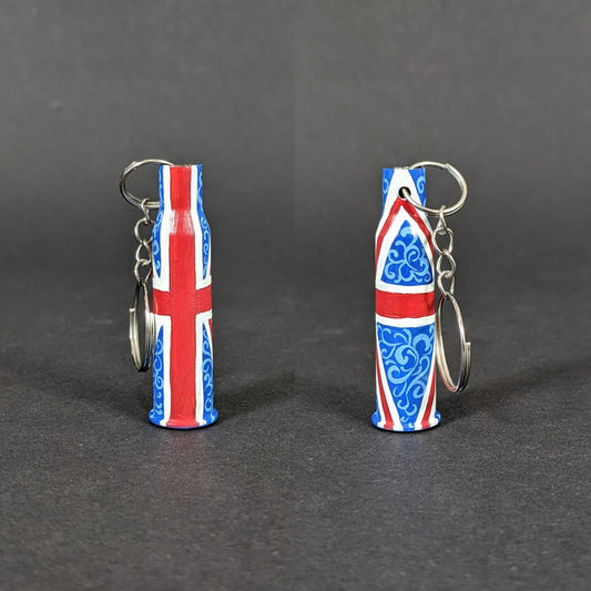 Small caliber keychain painted in British flag colors.