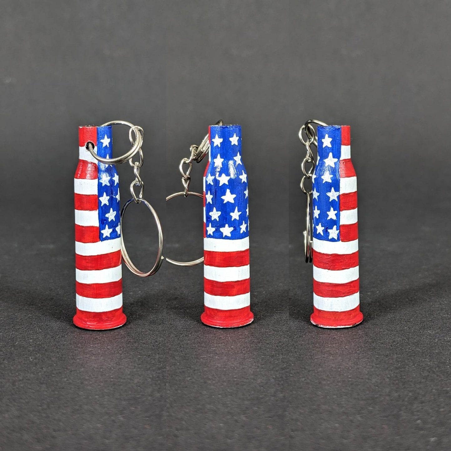 Small caliber keychain painted in American flag colors.