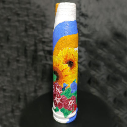 23mm shell with drawing of flowers. (15cm tall).