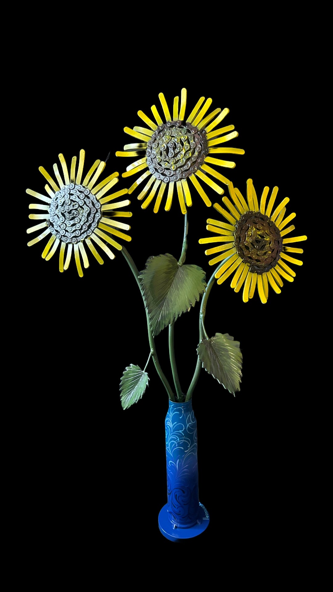 Sunflowers in Gepard shell vase.