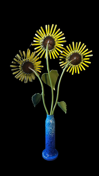 Sunflowers in Gepard shell vase.