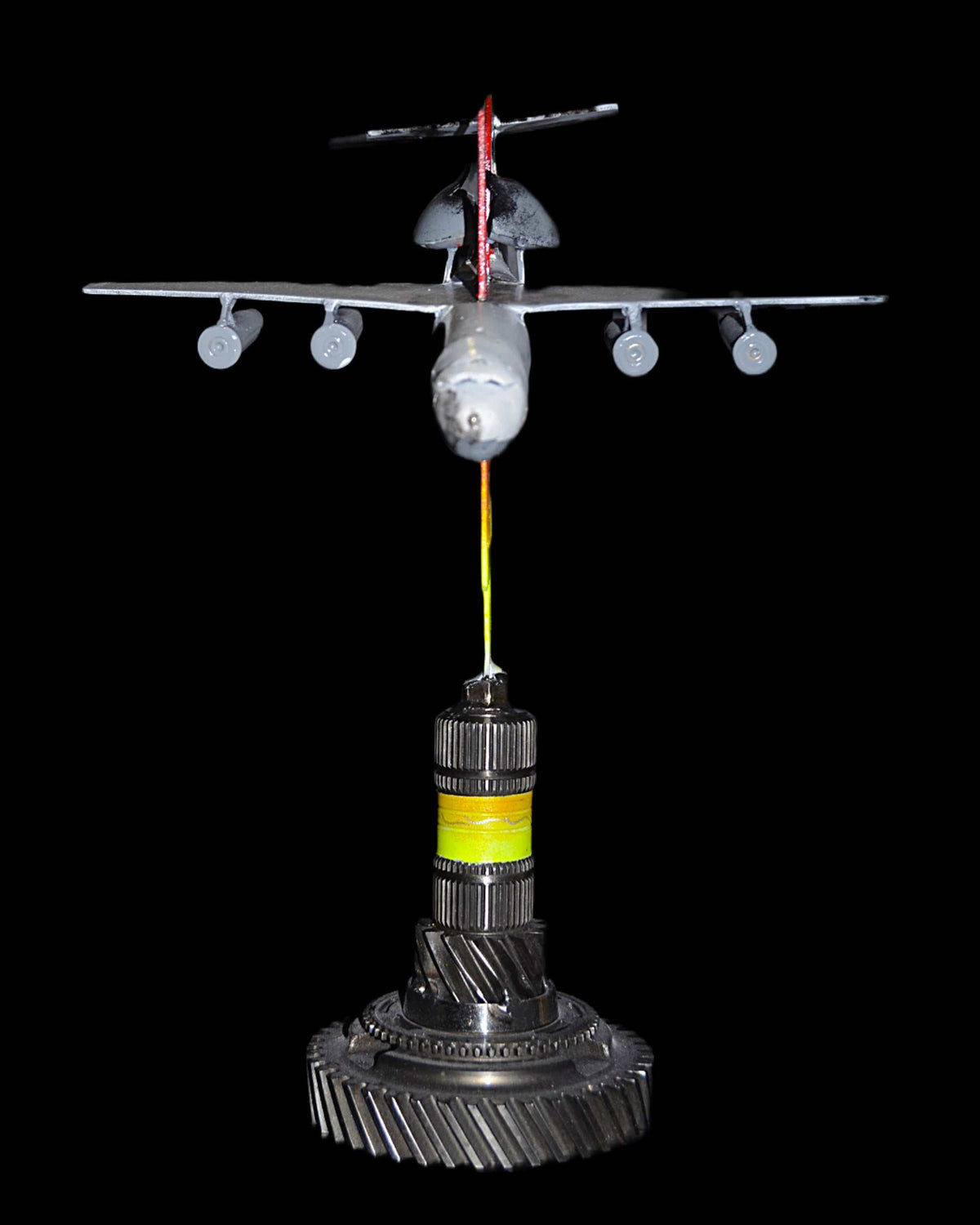 Downed A50 early warning aircraft model impaled on 36cm tall Tryzub sculpture