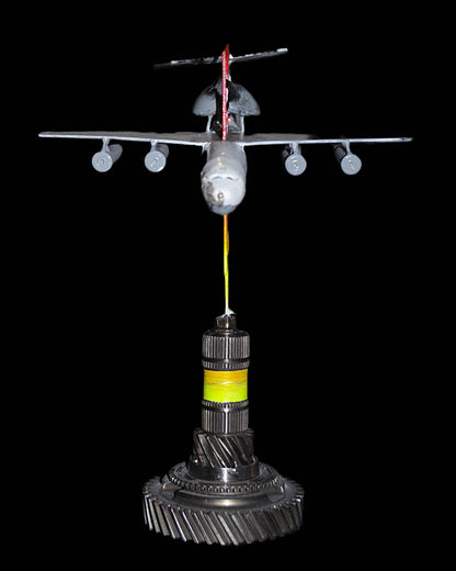 Downed A50 early warning aircraft model impaled on 36cm tall Tryzub sculpture