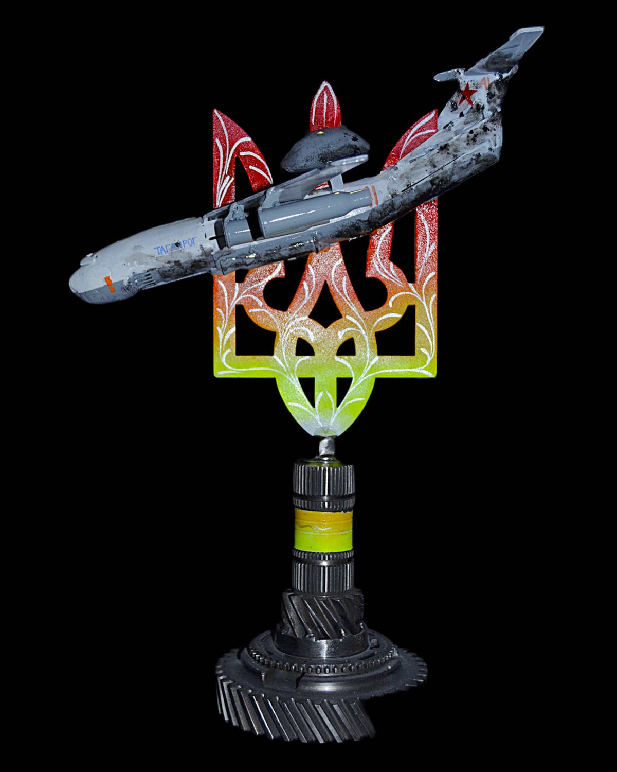 A50 early warning aircraft model impaled on 36cm Tryzub sculpture by Hisoshi Art Studio