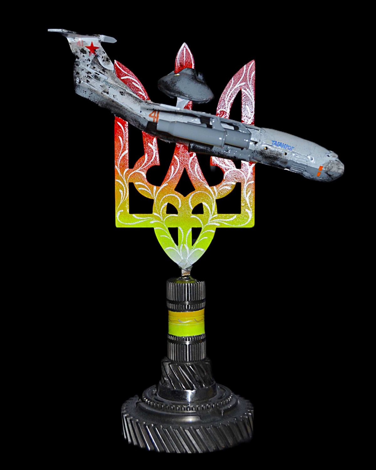 Downed A50 early warning aircraft model impaled on 36cm Tryzub sculpture by Hisoshi Art Studio