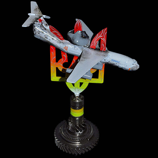 Downed A50 early warning aircraft model impaled on a 36cm Tryzub sculpture by Hisoshi Art Studio, painted by Anastasiya Leonova