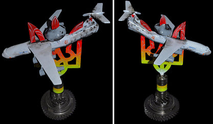 Downed A50 early warning aircraft model impaled on 36cm Tryzub sculpture, designed by Hisoshi Art Studio.