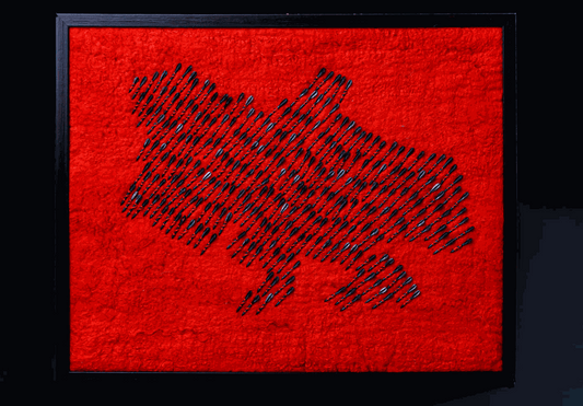 Air raid siren with wool map of Ukraine made from red wool and 300 fletchettes symbolizing destruction