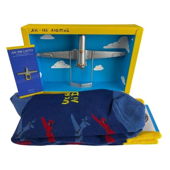 AN196 Liytui drone model with Liytui pin and Shark Drone socks, 16cm wingspan, available Spring 2026