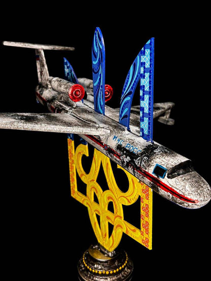 Destroyed Beriev Be-200 impaled on Tryzub sculpture artwork